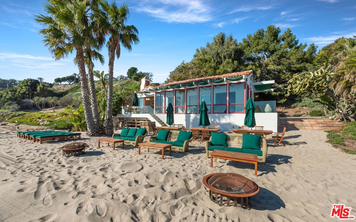 27910 Pacific Coast Highway Malibu, CA 90265 - Photo 7 of 28 an outdoor space with furniture and garden