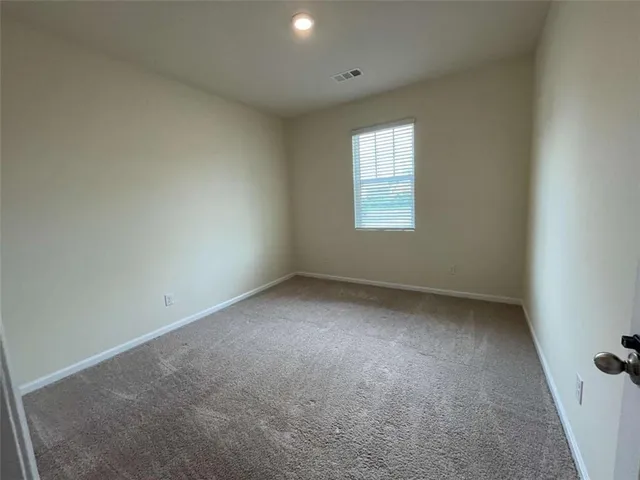 an empty room with closet