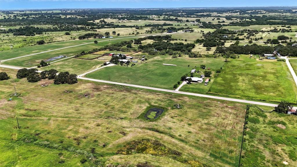 Lot 6 Colony Road Tolar, TX 76476 - Photo 7 of 10 an aerial view of a houses with a outdoor space