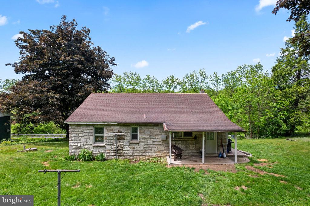 1644 Moselem Spring Road Hamburg, PA 19526 - Photo 4 of 26 Charming stone cottage in lush greenery.