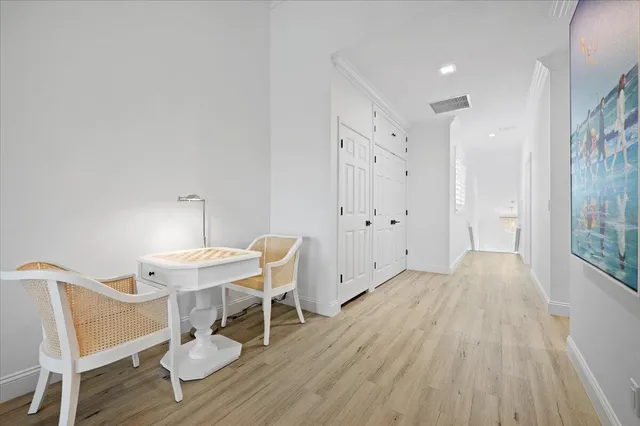 a view of a livingroom with furniture and wooden floor