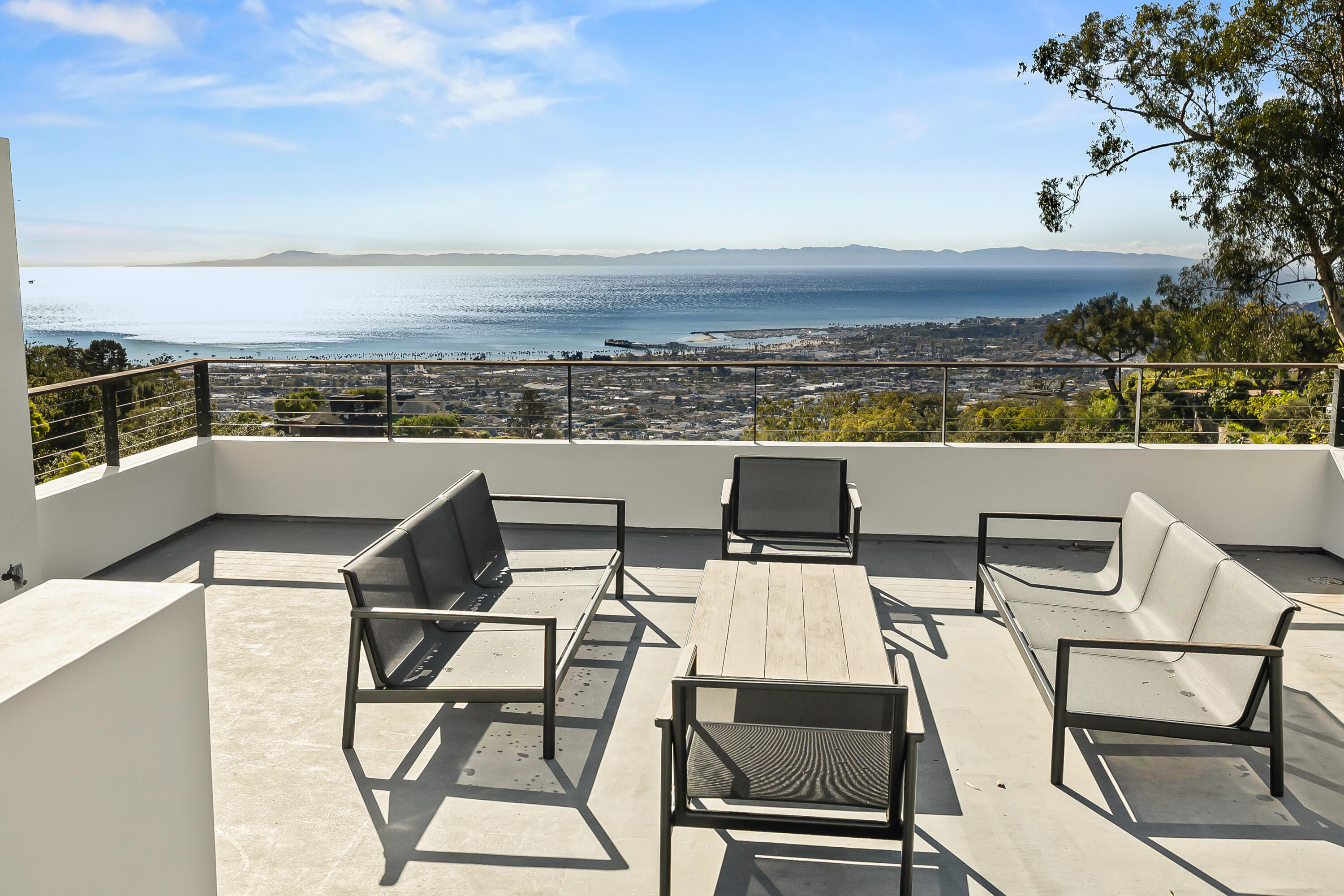 1131 Las Alturas Road, Unit SHARE B Santa Barbara, CA 93103 - Photo 25 of 32 a view of a terrace with furniture and city view