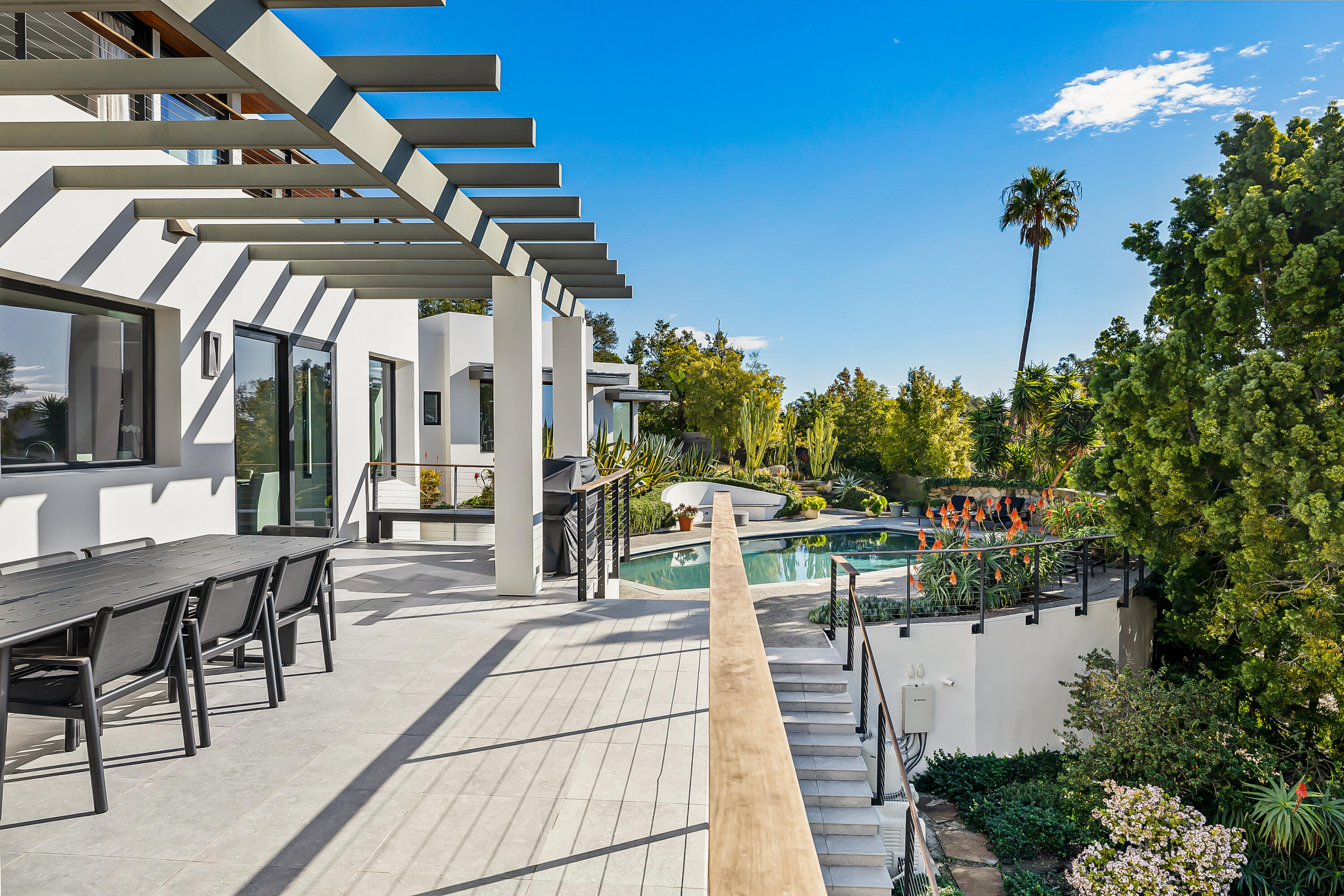 1131 Las Alturas Road, Unit SHARE B Santa Barbara, CA 93103 - Photo 26 of 32 a view of a chairs and tables in patio