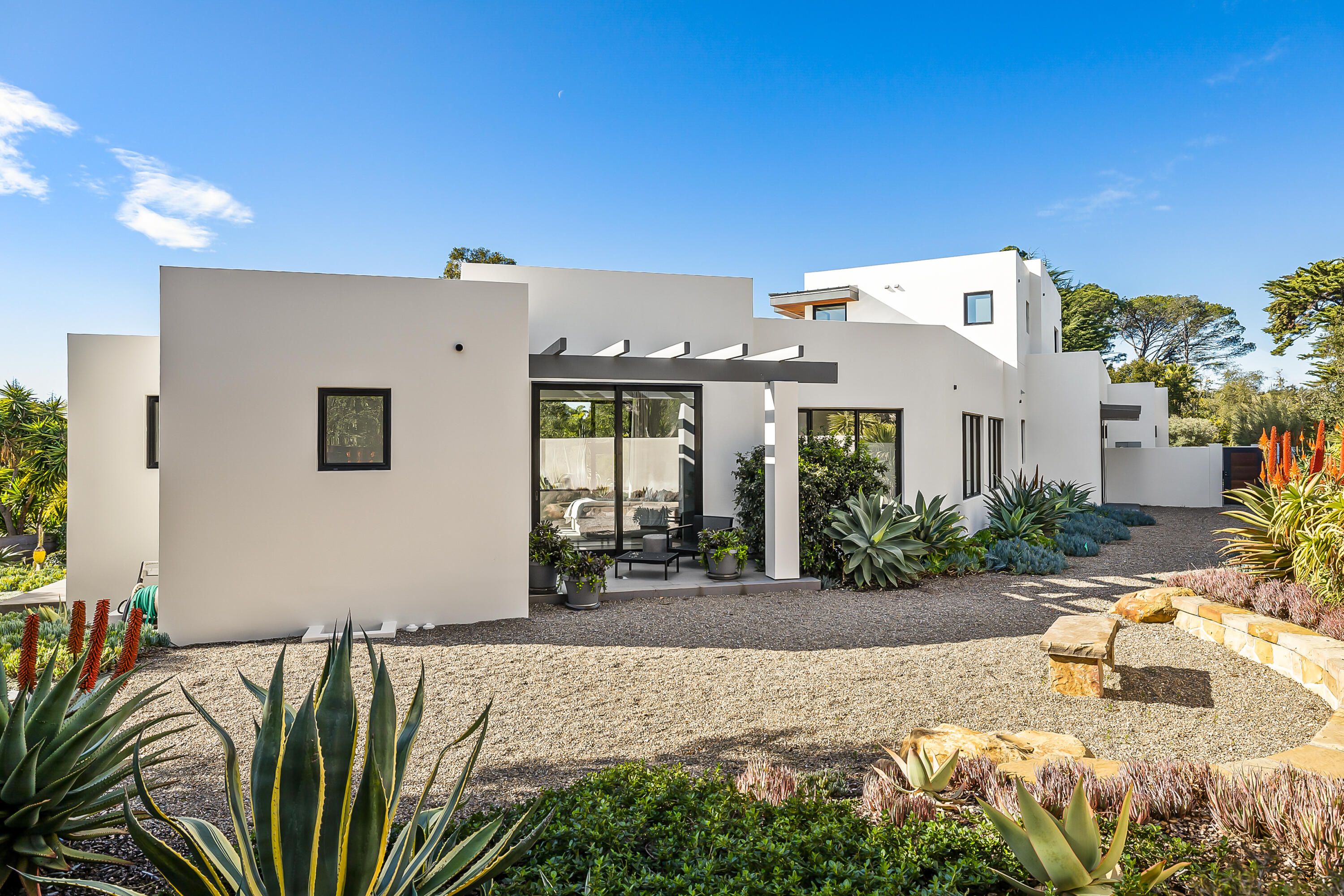 1131 Las Alturas Road, Unit SHARE B Santa Barbara, CA 93103 - Photo 30 of 32 a front view of a house with a yard