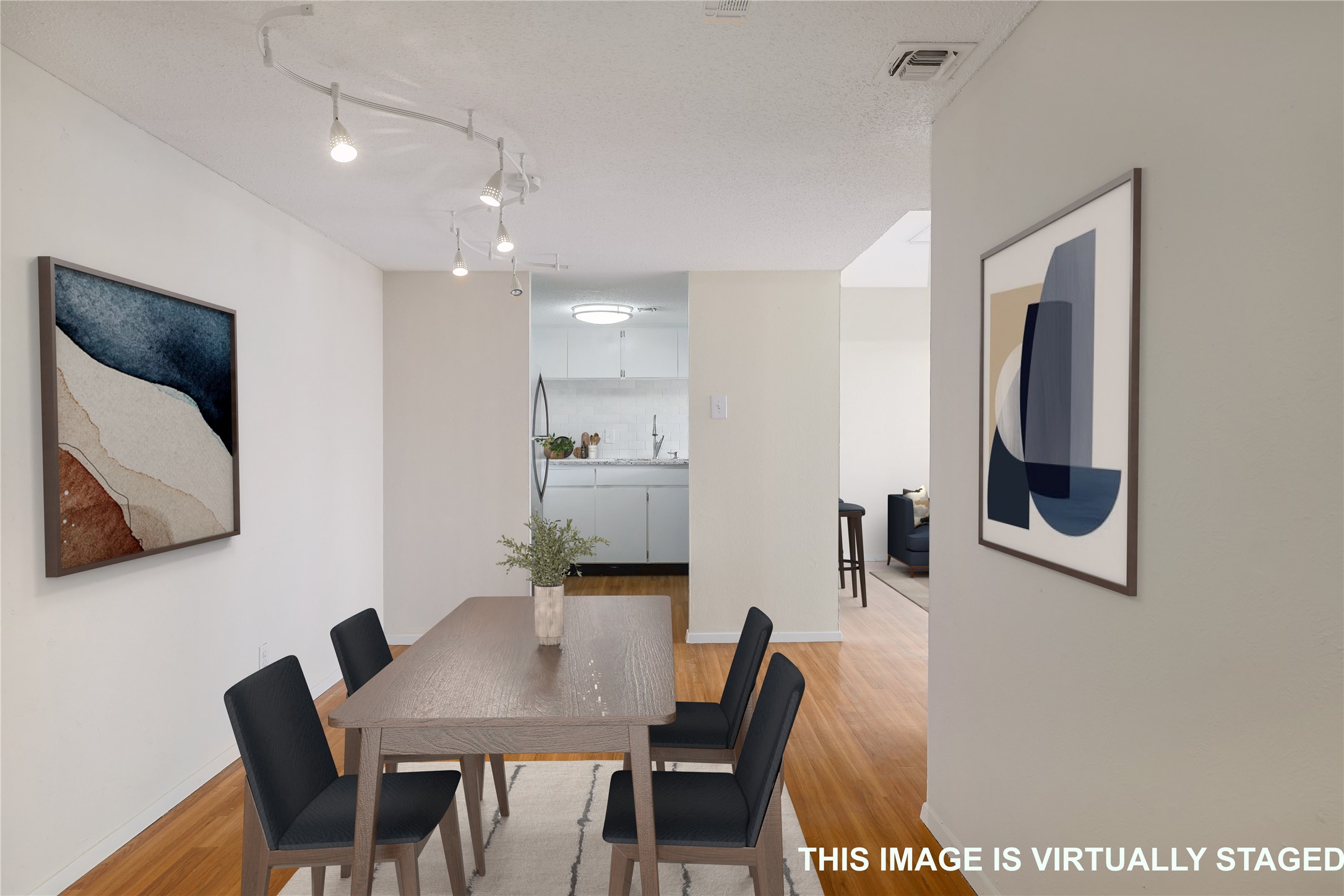 Warm laminate floors throughout.
