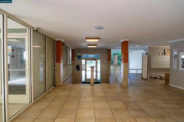 a view of a house with porch and furniture