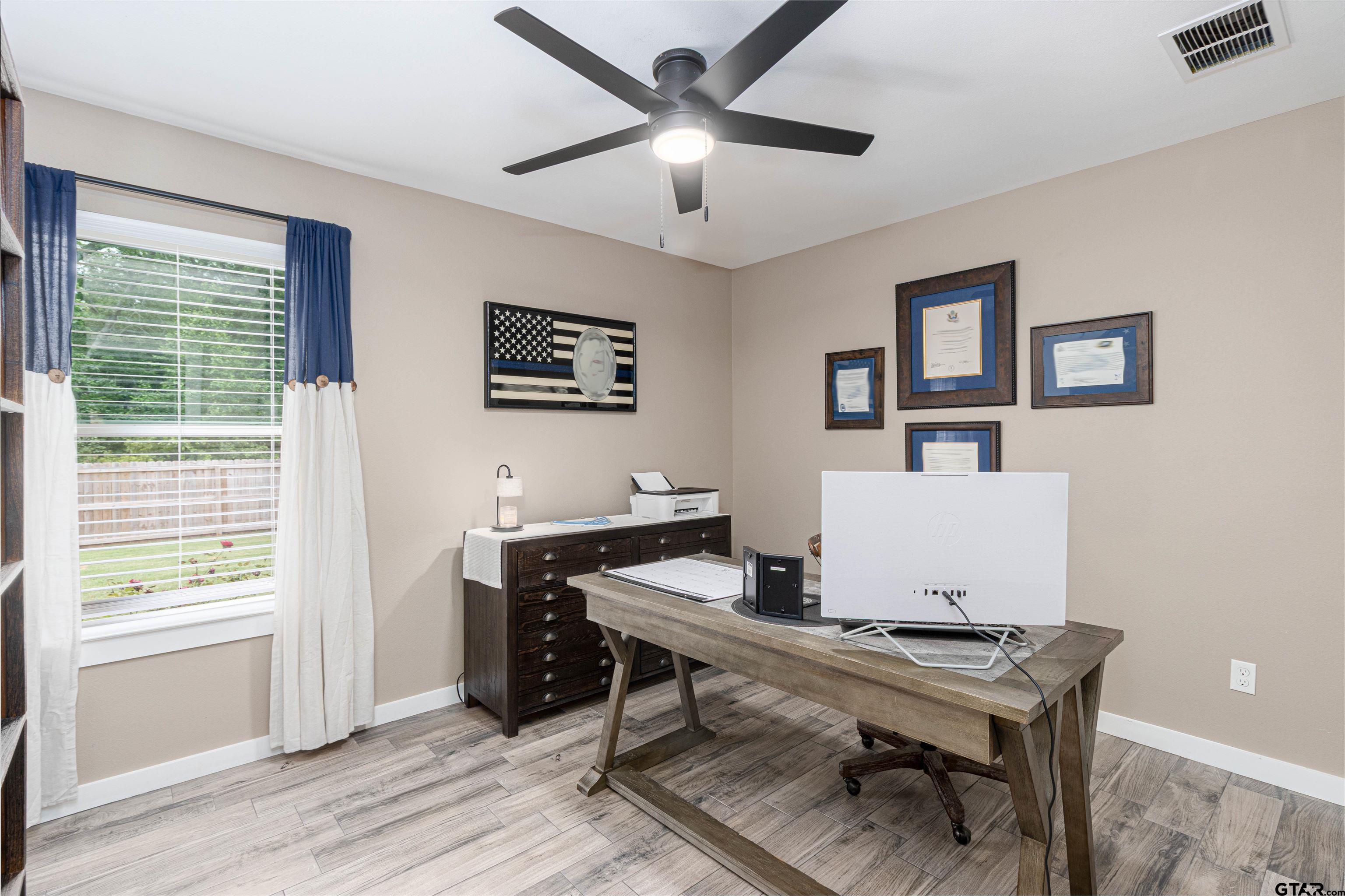 16210 Crossing Circle Lindale, TX 75771 - Photo 17 of 22 a workspace with furniture and window