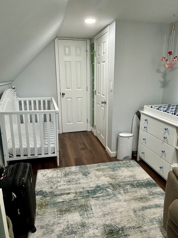 9 Church Street, Unit 9 Woburn, MA 01801 - Photo 19 of 31 a bedroom with a bed and a window