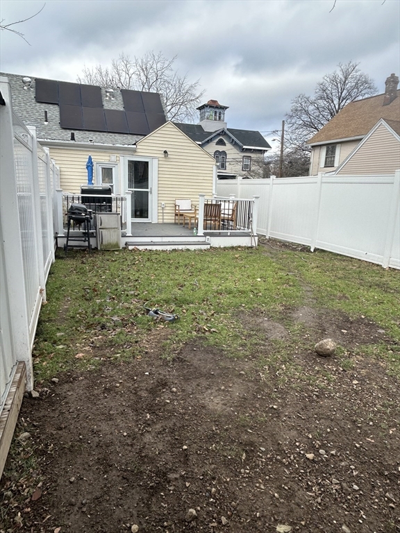 9 Church Street, Unit 9 Woburn, MA 01801 - Photo 27 of 31 a view of a house with a back yard