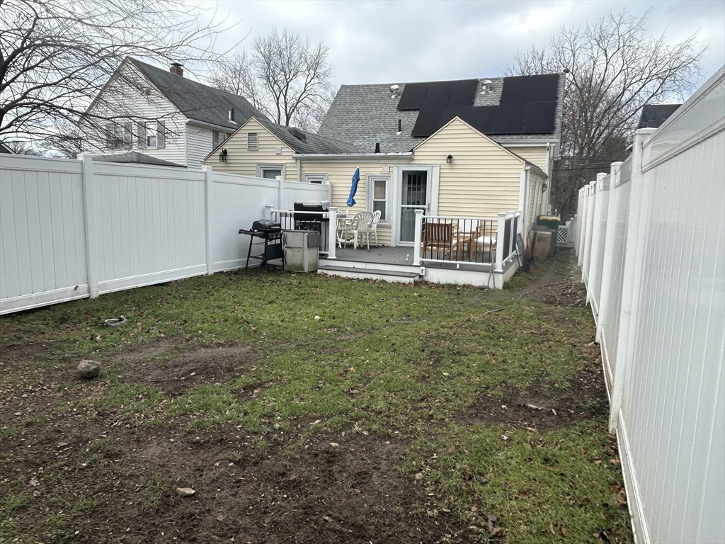 9 Church Street, Unit 9 Woburn, MA 01801 - Photo 29 of 31 a view of a house with a back yard