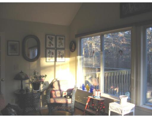34 Brookview Road Boxford, MA 01921 - Photo 8 of 8 a living room with furniture and a floor to ceiling window