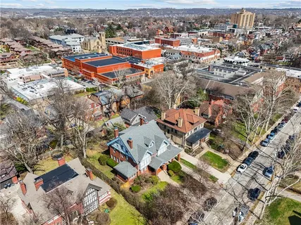 an aerial view of a city with lots of residential buildings