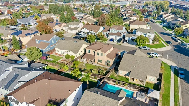 an aerial view of a yard with outdoor seating