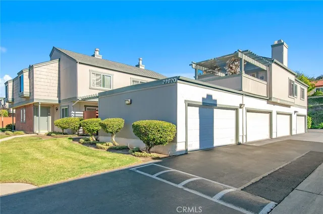 a front view of a building with an outdoor space