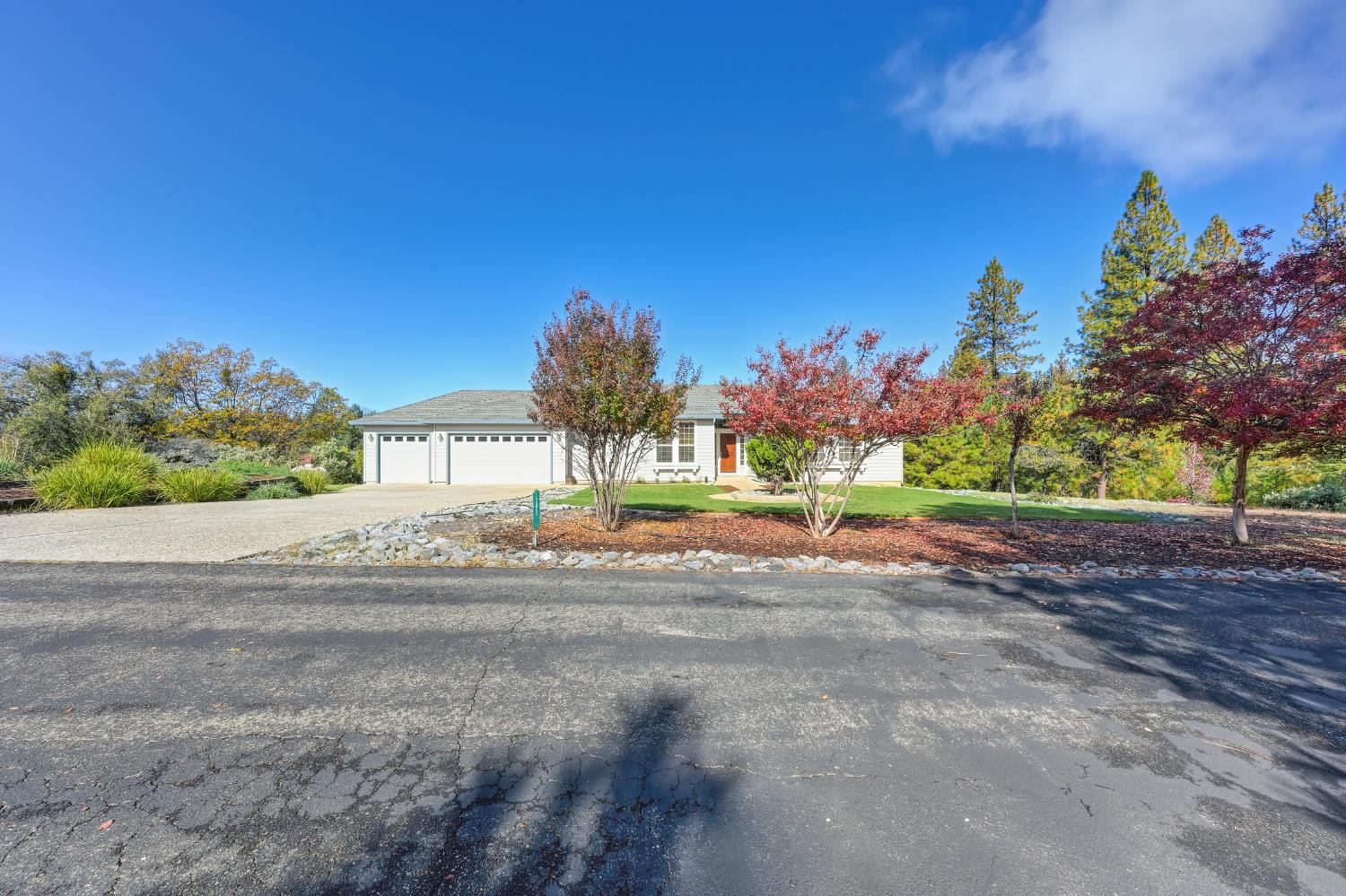 19740 Wedemeyer Place Applegate, CA 95703 - Photo 1 of 59 a view of a house with a yard and a street