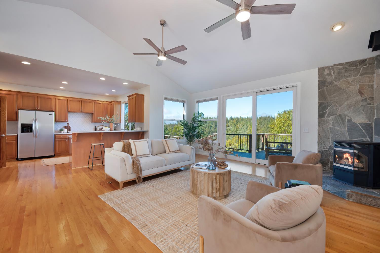 19740 Wedemeyer Place Applegate, CA 95703 - Photo 12 of 59 a living room with furniture fireplace and a large window
