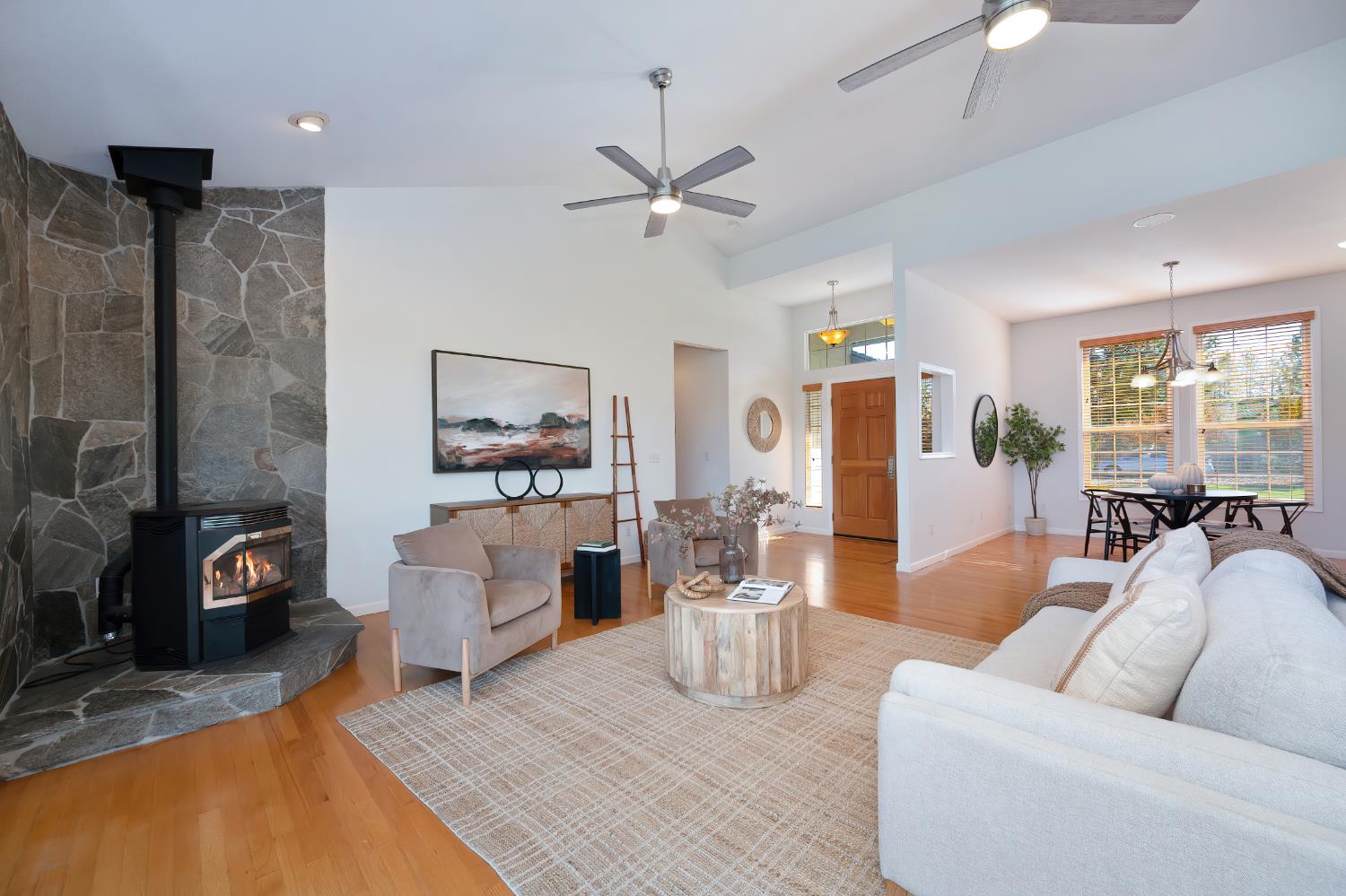 19740 Wedemeyer Place Applegate, CA 95703 - Photo 14 of 59 a living room with furniture and a chandelier