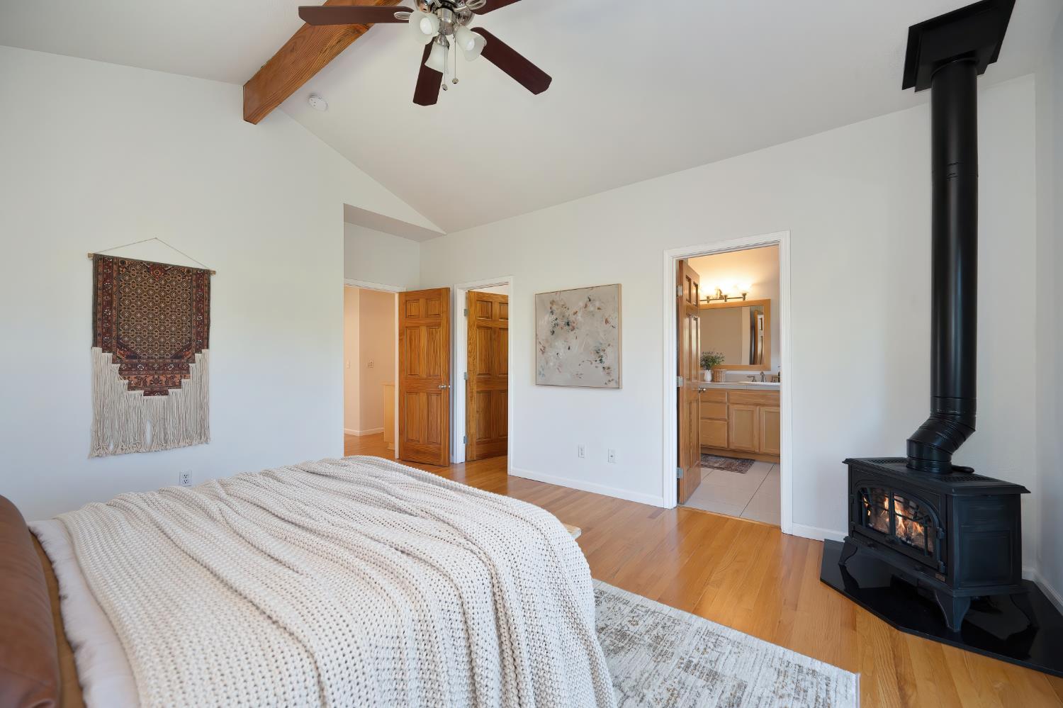 19740 Wedemeyer Place Applegate, CA 95703 - Photo 36 of 59 a bedroom with a bed and wooden floor