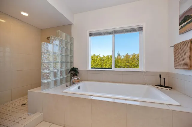 a view of a chairs on the roof deck