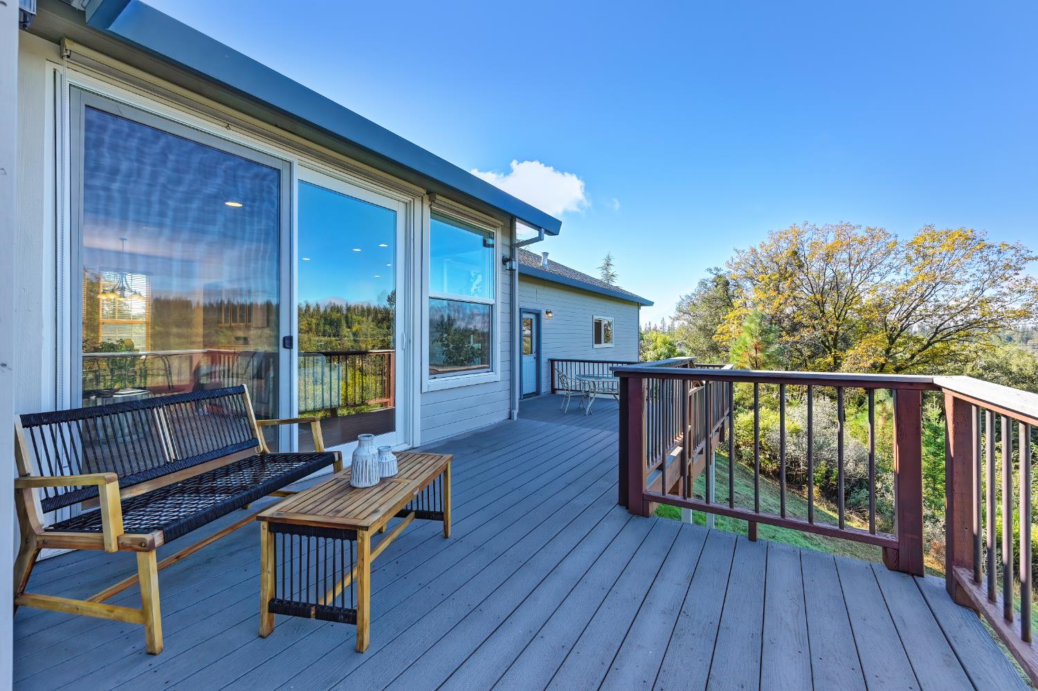 19740 Wedemeyer Place Applegate, CA 95703 - Photo 44 of 59 a balcony with wooden floor and outdoor seating