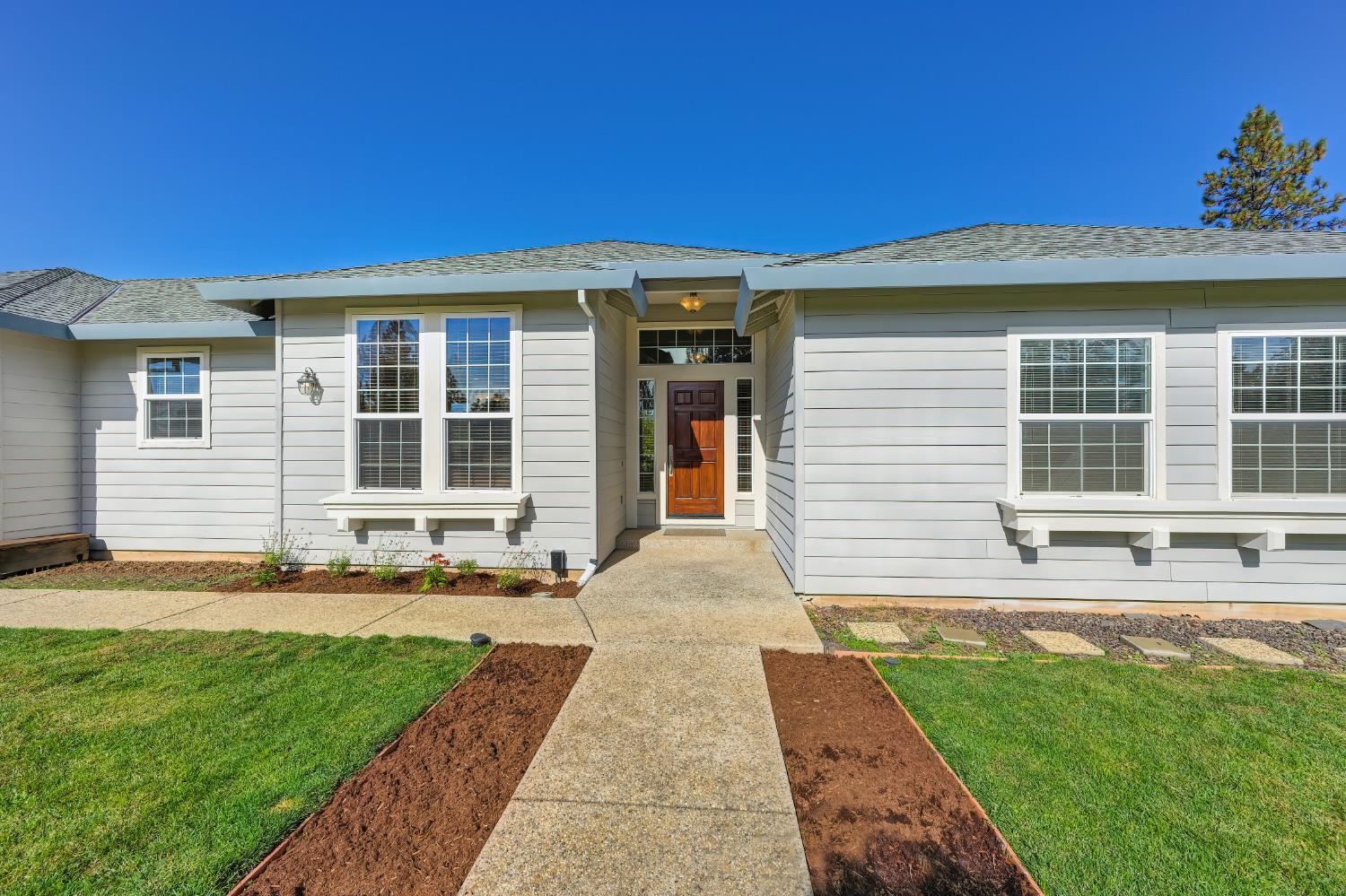 19740 Wedemeyer Place Applegate, CA 95703 - Photo 9 of 59 a front view of a house with a yard