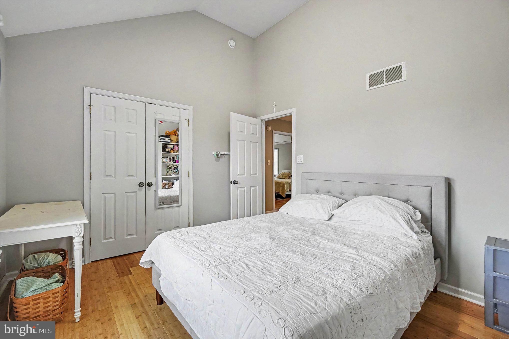 64 Open Meadow Court Elkton, MD 21921 - Photo 35 of 57 a bedroom with a bed and a table