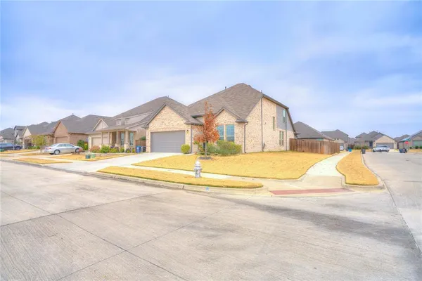 a view of house with a swimming pool