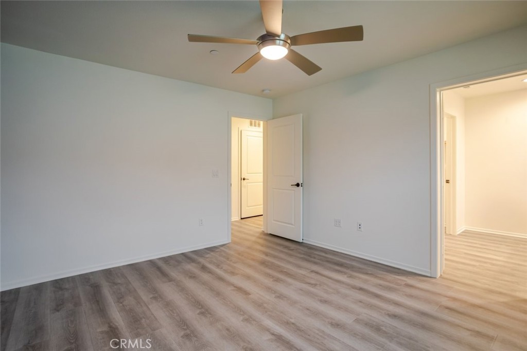 863 Iris Way, Unit B Azusa, CA 91702 - Photo 18 of 29 wooden floor in an empty room