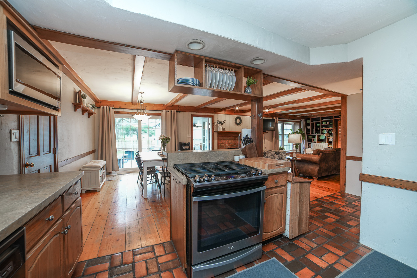 720 Periwinkle Turn Bourbonnais, IL 60914 - Photo 17 of 42 a kitchen with stainless steel appliances granite countertop a stove and a sink