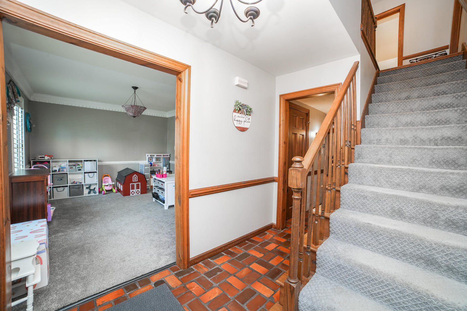 720 Periwinkle Turn Bourbonnais, IL 60914 - Photo 23 of 42 a view of hallway with livingroom and stairs