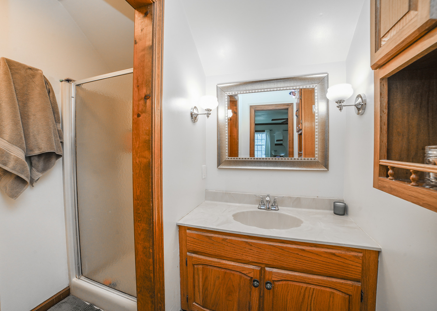 720 Periwinkle Turn Bourbonnais, IL 60914 - Photo 27 of 42 a bathroom with a sink a mirror and a shower