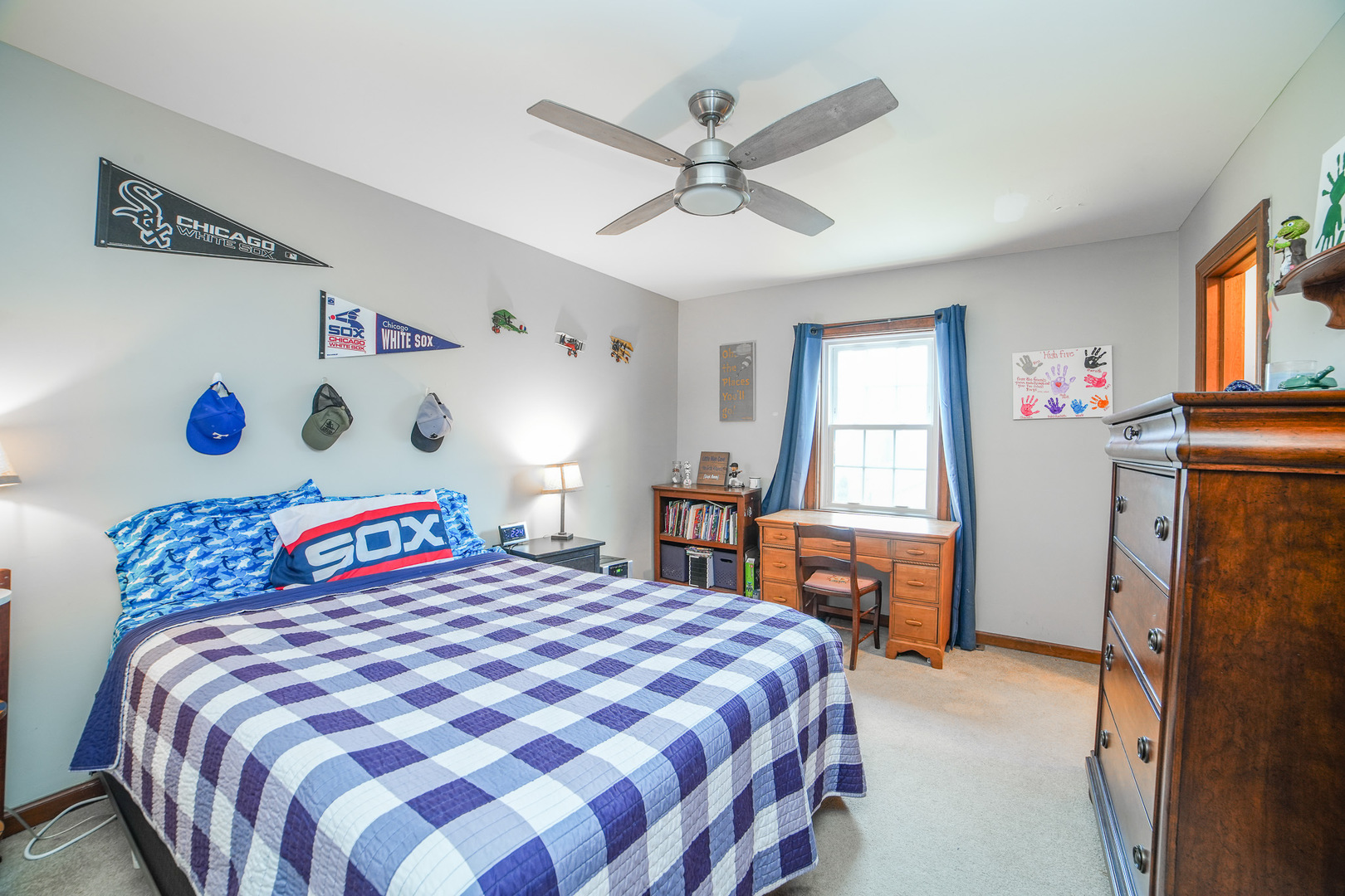 720 Periwinkle Turn Bourbonnais, IL 60914 - Photo 28 of 42 a bedroom with a bed and a chandelier