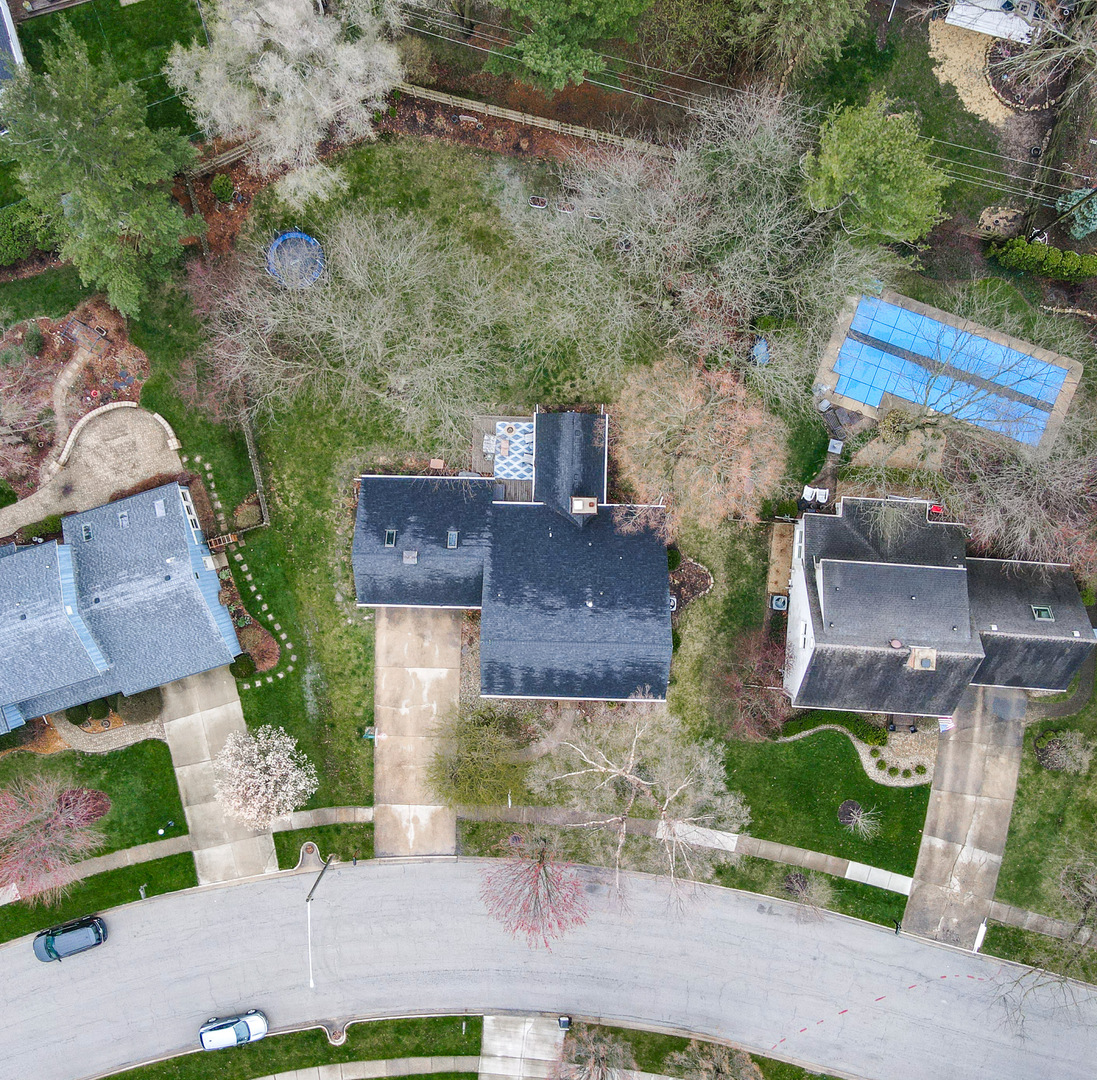 720 Periwinkle Turn Bourbonnais, IL 60914 - Photo 37 of 42 an aerial view of a house with a yard and a large tree