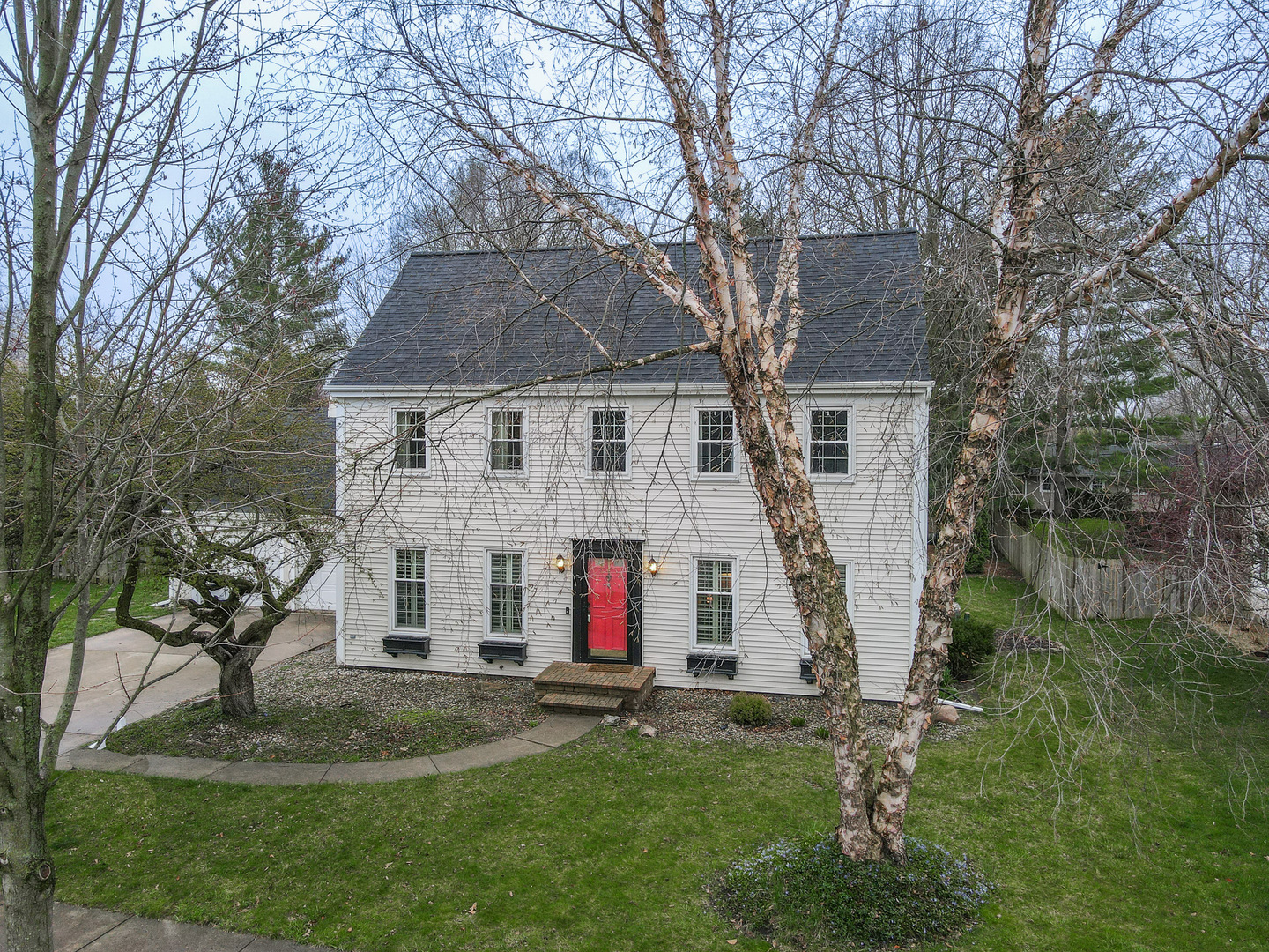 720 Periwinkle Turn Bourbonnais, IL 60914 - Photo 38 of 42 a view of small white house with a yard and plants