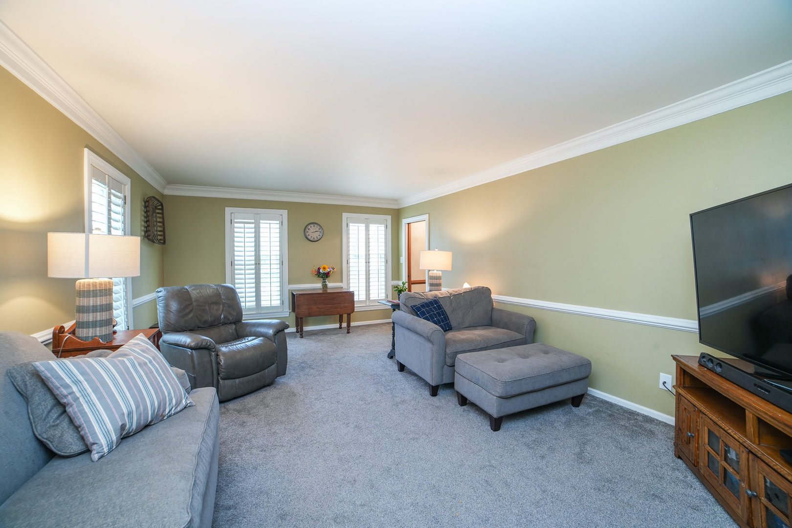 720 Periwinkle Turn Bourbonnais, IL 60914 - Photo 6 of 42 a living room with furniture and a flat screen tv