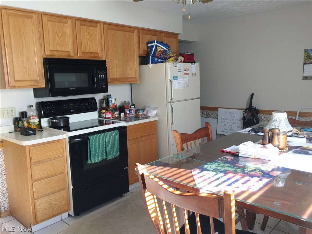 6330-6332 Manchester Road Parma, OH 44129 - Photo 5 of 24 Large Eat in kitchen of 6330 Manchester. Stove does not convey.