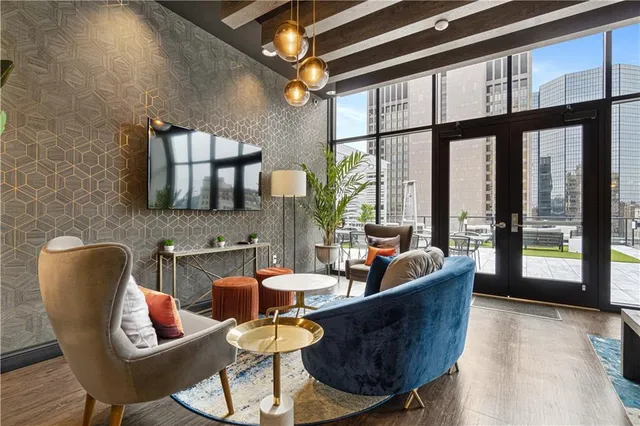 a view of a patio with chairs and tables