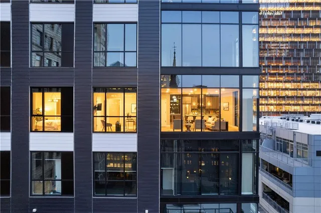 a view of a city with tall buildings