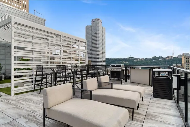 a bathroom with a sink a mirror and a toilet