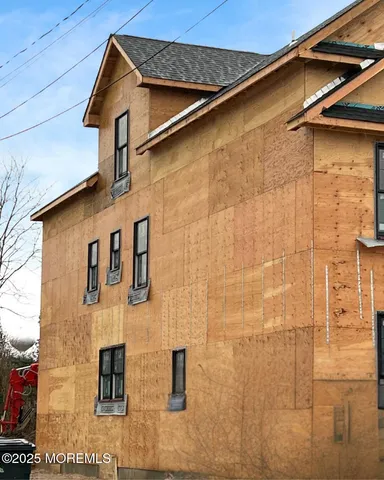 a street sign on a brick building