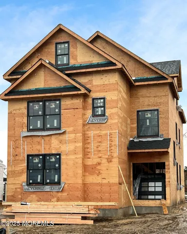 a front view of a house with glass windows