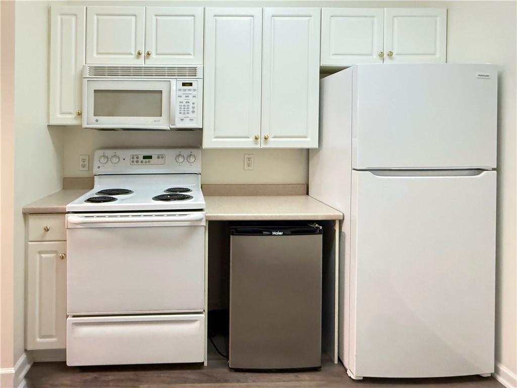 715 Stockton Ridge Cranberry Township, PA 16066 - Photo 11 of 27 a white refrigerator freezer and a stove sitting inside of a kitchen