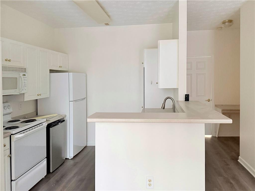 715 Stockton Ridge Cranberry Township, PA 16066 - Photo 12 of 27 a kitchen with stainless steel appliances a sink and a refrigerator