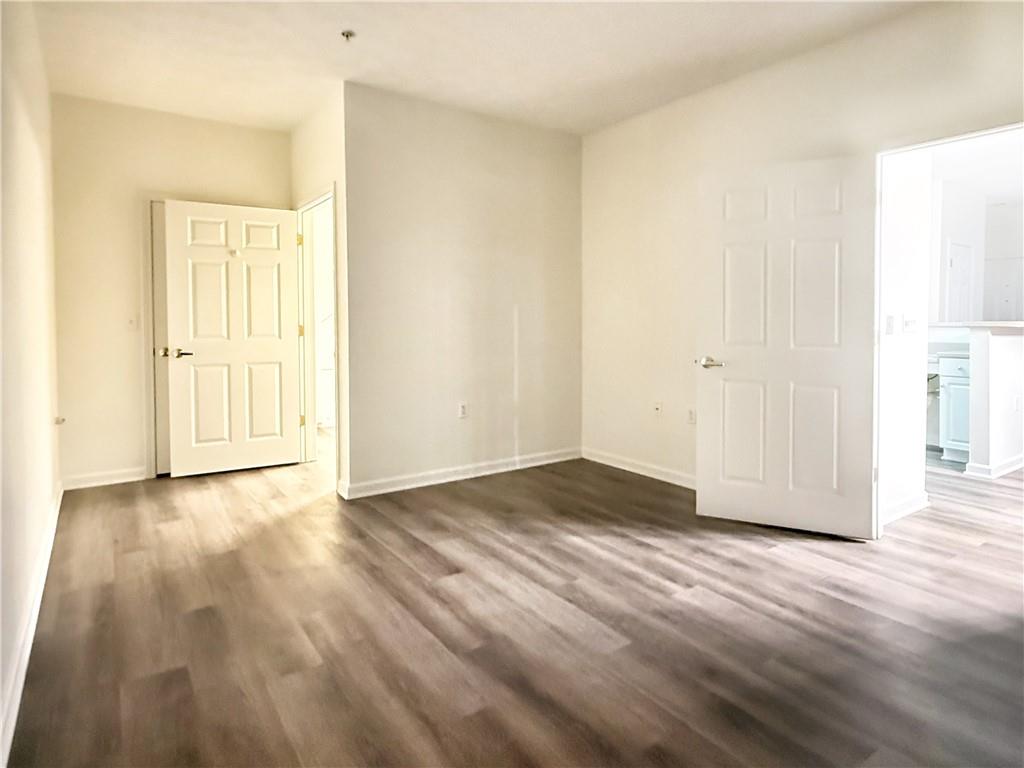 715 Stockton Ridge Cranberry Township, PA 16066 - Photo 13 of 27 a view of an empty room and wooden floor