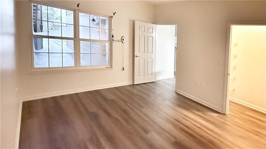 715 Stockton Ridge Cranberry Township, PA 16066 - Photo 18 of 27 an empty room with wooden floor and windows