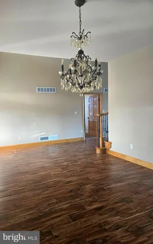 a view of balcony with furniture