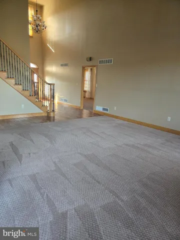 a white toilet sitting next to a bath tub