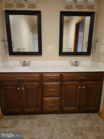 a view of a chairs and table in the patio