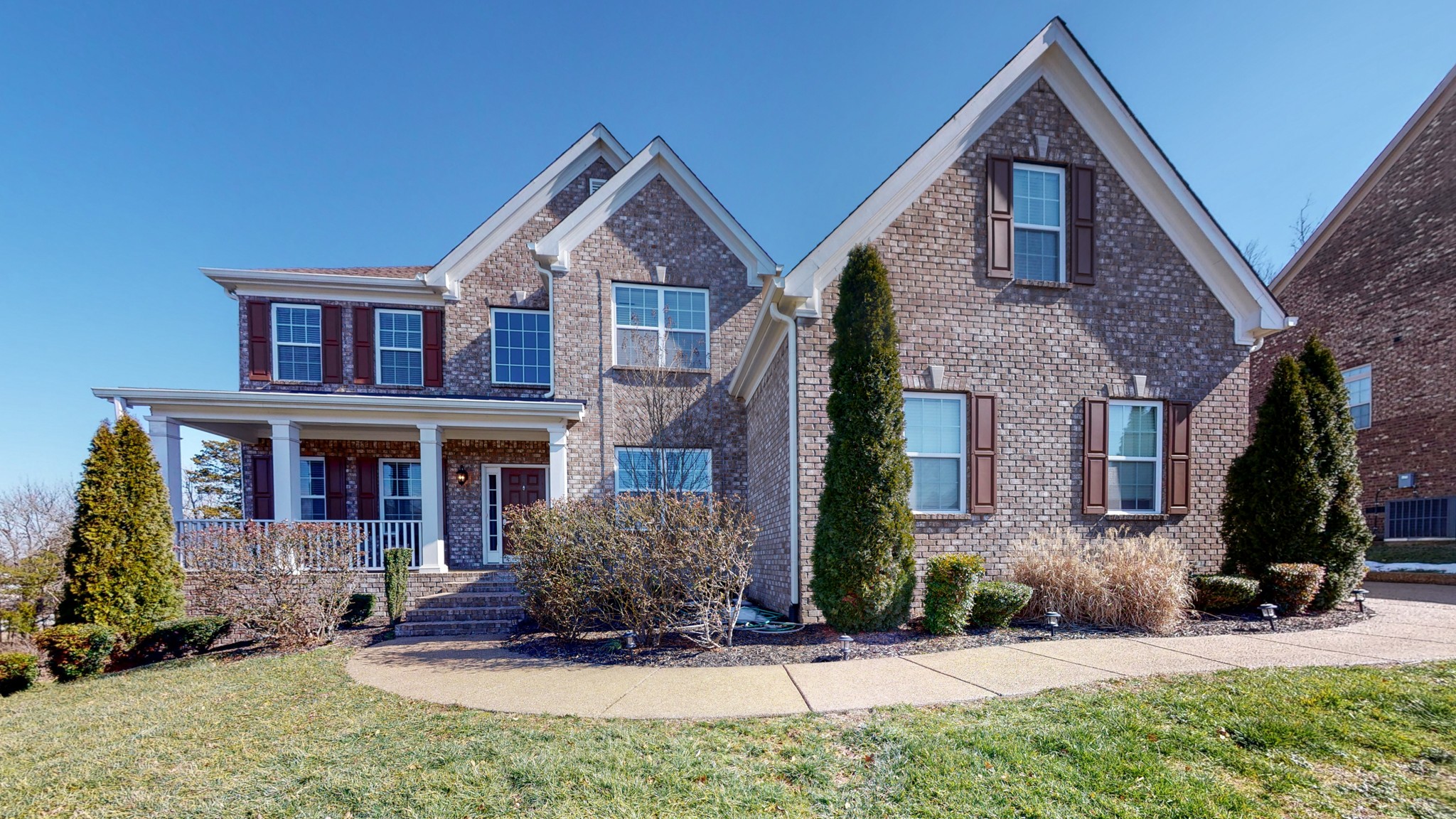 6137 Stags Leap Way Franklin, TN 37064 - Photo 1 of 27 a front view of a house with a yard
