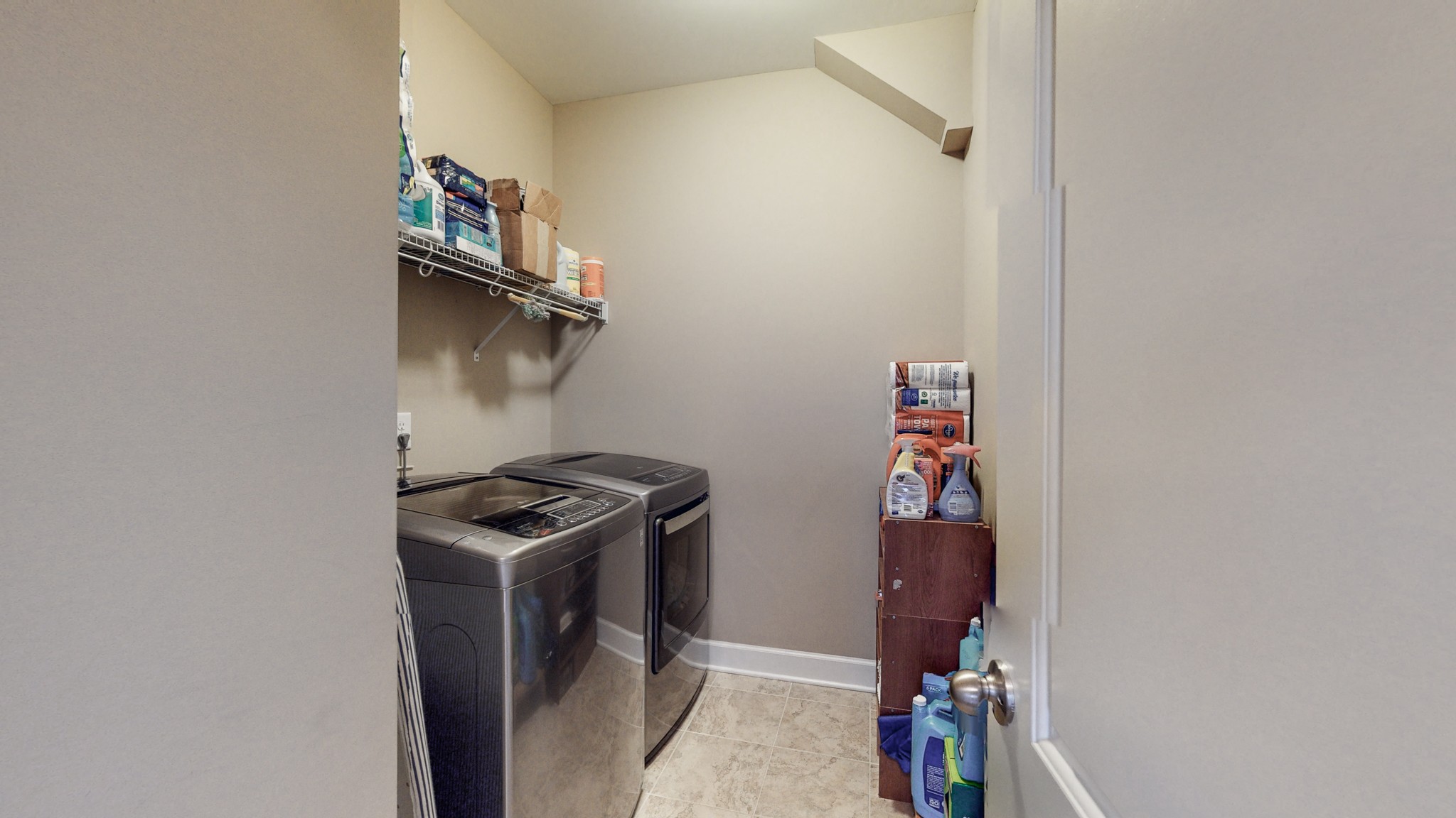 6137 Stags Leap Way Franklin, TN 37064 - Photo 15 of 27 a view of storage and utility room with washer and dryer